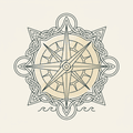 Celtic compass rose with coastal waves
